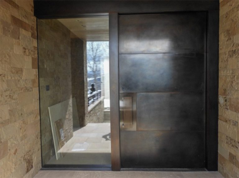 Oversized pivot entry door